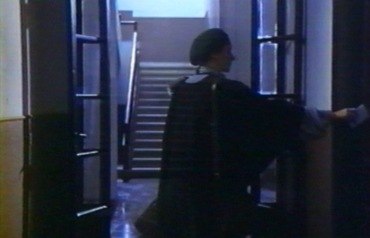 Nostalghia, plan 77e, La Traductrice qui a enroulé ses cheveux sous un béret.