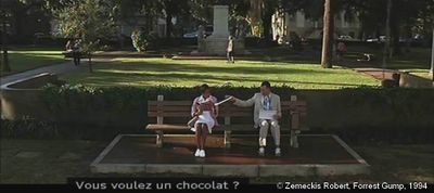Forrest Gump de Robert Zemeckis. Photogramme banc 5 : Forrest présente devant le nez de la nurse, la boîte au chocolat : « Vous voulez un chocolat ? »